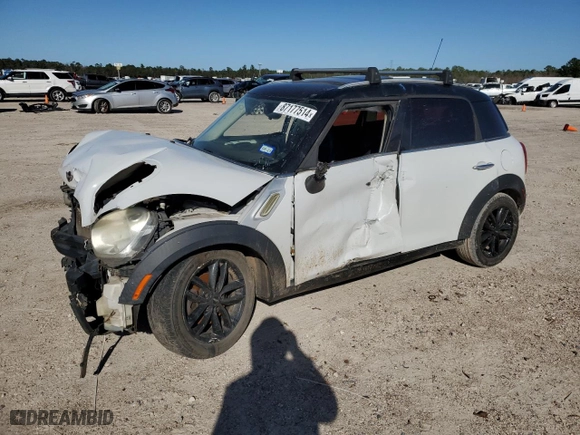 2011 MINI Cooper Countryman with VIN WMWZB3C59BWH94541, listed as a Copart auction lot 87177514 with 186,979 mi miles and Salvage Title. Bid and sale history available at carsss.com. Image 1.