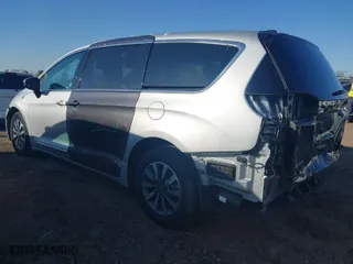 2023 Chrysler Pacifica Hybrid Limited with VIN 2C4RC1S72PR588627, listed as a IAAI auction lot 42063631 with 52,799 mi miles. Bid and sale history available at carsss.com. Image 3.
