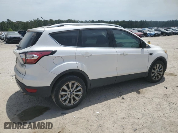 2018 Ford Escape Titanium with VIN 1FMCU0J99JUA06741, listed as a Copart auction lot 55782195 with 103,392 mi miles and Salvage title. Bid and sale history available at DreamBid. Image 3.