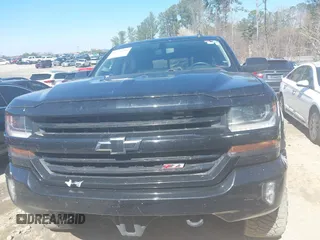 2017 Chevrolet Silverado 1500 LT with VIN 3GCUKREC1HG358752, listed as a IAAI auction lot 41775110 with 150,528 mi miles and . Bid and sale history available at DreamBid. Image 12.