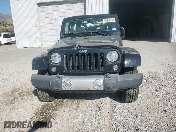 2015 Jeep Wrangler Sahara with VIN 1C4AJWBG5FL733795, listed as a Copart auction lot 61998255 with 86,655 mi miles and Salvage title. Bid and sale history available at DreamBid. Image 13.