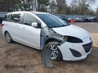2013 Mazda 5 Sport with VIN JM1CW2BL0D0144801, listed as a IAAI auction lot 41743663 with 140,392 mi miles and . Bid and sale history available at DreamBid. Image 1.