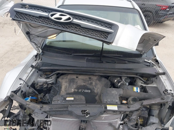 2007 Hyundai Tucson SE with VIN KM8JN12D57U670203, listed as a IAAI auction lot 41619422 with 92,450 mi miles. Bid and sale history available at carsss.com. Image 10.