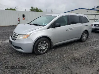 2013 Honda Odyssey EX-L с VIN 5FNRL5H64DB081600, выставлен на аукционе Copart как лот 58409145 с пробегом 186 588 миль миль и Списание • Salvage title. История ставок и продаж доступна на DreamBid. Изображение 1.