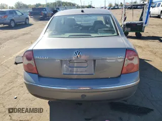 2004 Volkswagen Passat GLX z VIN WVWRH63B14P058955, wystawiony jako Copart lot #75076284 z przebiegiem 160 844 mil mil oraz Czysty tytuł • Clean title. Historia ofert i sprzedaży dostępna na DreamBid. Obrazek 6.