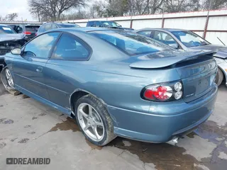 2006 Pontiac GTO with VIN 6G2VX12UX6L561098, listed as a IAAI auction lot 41487635 with 69,741 mi miles. Bid and sale history available at carsss.com. Image 3.