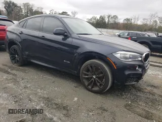 2019 BMW X6 sDrive35i z VIN 5UXKU0C51K0G92987, wystawiony jako Copart lot #79881064 z przebiegiem 136 577 mil mil oraz Czysty tytuł • Clean title. Historia ofert i sprzedaży dostępna na DreamBid. Obrazek 4.