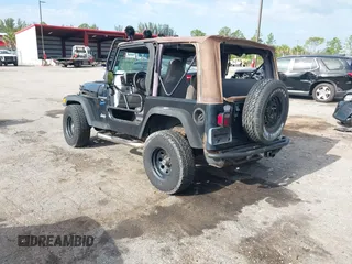 1997 Jeep Wrangler Sport with VIN 1J4FY19S5VP539283, listed as a IAAI auction lot 41996476 with 131,593 mi miles and . Bid and sale history available at DreamBid. Image 3.