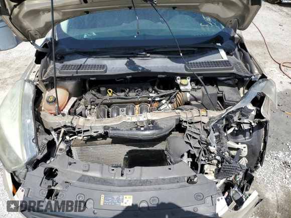 2017 Ford Escape S z VIN 1FMCU0F74HUA19804, wystawiony jako Copart lot #60260425 z przebiegiem 105 587 mil mil oraz Szkoda całkowita • Salvage title. Historia ofert i sprzedaży dostępna na DreamBid. Obrazek 12.