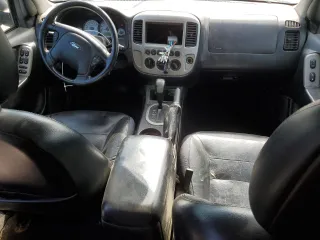 2005 Ford Escape Limited with VIN 1FMYU041X5KC72704, listed as a Copart auction lot 57819655 with 179,469 mi miles and Salvage title. Bid and sale history available at DreamBid. Image 8.