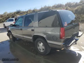 1999 Chevrolet Tahoe Z71 with VIN 1GNEK13RXXR135208, listed as a Copart auction lot 72838684 with 120,330 mi miles and Salvage Title. Bid and sale history available at carsss.com. Image 2.