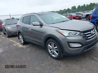 2014 Hyundai Santa Fe z VIN 5XYZW3LA2EG217854, wystawiony jako IAAI lot #42318822 z przebiegiem 120 234 mil mil oraz . Historia ofert i sprzedaży dostępna na DreamBid. Obrazek 1.