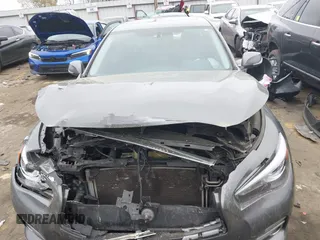 2014 Infiniti Q50 Premium z VIN JN1BV7AP8EM674625, wystawiony jako IAAI lot #41922173 z przebiegiem Nie podano mil oraz . Historia ofert i sprzedaży dostępna na DreamBid. Obrazek 12.