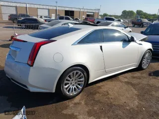 2014 Cadillac CTS Coupe Premium with VIN 1G6DD1E3XE0125273, listed as a IAAI auction lot 40534372 with 144,620 mi miles. Bid and sale history available at carsss.com. Image 4.