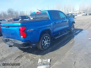 2023 Chevrolet Colorado 4WD Z71 with VIN 1GCPTDEKXP1247067, listed as a IAAI auction lot 41760802 with 21,259 mi miles. Bid and sale history available at carsss.com. Image 4.
