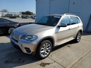 2013 BMW X5 xDrive35i with VIN 5UXZV4C56D0E02961, listed as a Copart auction lot 43245075 with 168,726 mi miles and Clean Title. Bid and sale history available at carsss.com. Image 1.