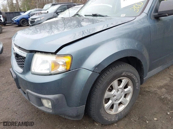 2010 Mazda Tribute Sport with VIN 4F2CY9C79AKM01295, listed as a IAAI auction lot 41962901 with 183,002 mi miles. Bid and sale history available at carsss.com. Image 6.