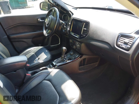 2021 Jeep Compass Limited with VIN 3C4NJDCB3MT599685, listed as a IAAI auction lot 42435075 with 58,426 mi miles and . Bid and sale history available at DreamBid. Image 5.