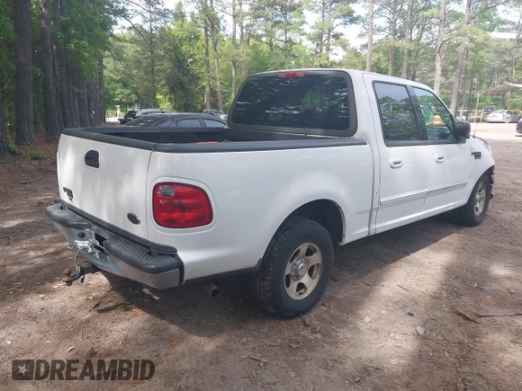 2003 Ford F-150 XLT with VIN 1FTRW07663KD69809, listed as a IAAI auction lot 42198549 with 166,466 mi miles and . Bid and sale history available at DreamBid. Image 4.