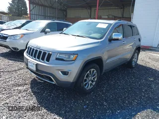 2014 Jeep Grand Cherokee Limited with VIN 1C4RJFBG5EC588971, listed as a IAAI auction lot 41971004 with 154,122 mi miles and . Bid and sale history available at DreamBid. Image 2.