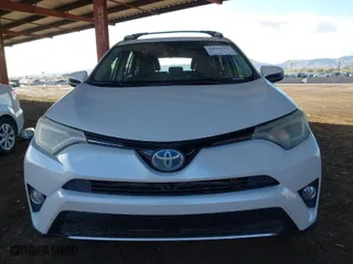 2016 Toyota RAV4 Hybrid Limited with VIN JTMDJREV6GD016181, listed as a IAAI auction lot 41616922 with 95,037 mi miles. Bid and sale history available at carsss.com. Image 12.