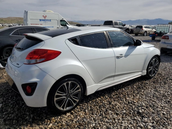 2016 Hyundai Veloster Turbo z VIN KMHTC6AE6GU302201, wystawiony jako Copart lot #54613235 z przebiegiem 105 796 mil mil oraz Szkoda całkowita • Salvage title. Historia ofert i sprzedaży dostępna na DreamBid. Obrazek 3.