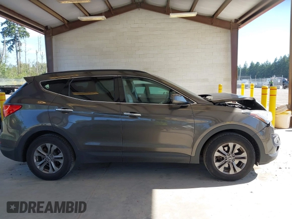 2014 Hyundai Santa Fe z VIN 5XYZUDLB0EG187192, wystawiony jako IAAI lot #42360255 z przebiegiem 154 607 mil mil oraz . Historia ofert i sprzedaży dostępna na DreamBid. Obrazek 13.