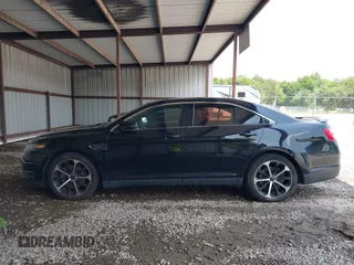 2016 Ford Taurus SHO z VIN 1FAHP2KT4GG140903, wystawiony jako IAAI lot #42415173 z przebiegiem 141 392 mil mil oraz . Historia ofert i sprzedaży dostępna na DreamBid. Obrazek 13.