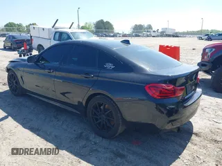 2019 BMW 4 Series 430i with VIN WBA4J1C59KBM17309, listed as a IAAI auction lot 42011443 with 87,189 mi miles. Bid and sale history available at carsss.com. Image 3.