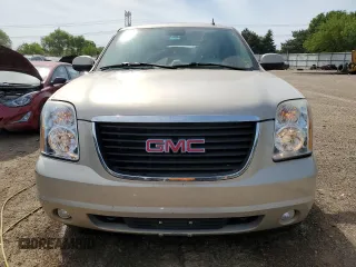 2007 GMC Yukon SLT with VIN 1GKFK13057J305802, listed as a Copart auction lot 57156884 with 218,494 mi miles and Salvage Title. Bid and sale history available at carsss.com. Image 5.
