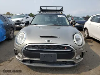 2017 MINI Clubman Cooper S with VIN WMWLU5C55H2F24329, listed as a Copart auction lot 67163314 with 129,818 mi miles and Salvage Title. Bid and sale history available at carsss.com. Image 5.