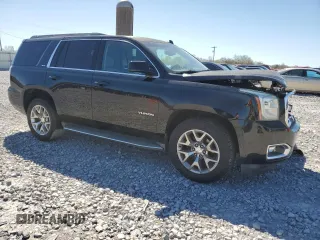 2015 GMC Yukon SLT z VIN 1GKS1BKC2FR244797, wystawiony jako Copart lot #49465995 z przebiegiem 242 448 mil mil oraz Szkoda całkowita • Salvage title. Historia ofert i sprzedaży dostępna na DreamBid. Obrazek 4.