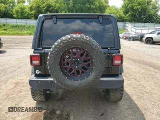 2020 Jeep Wrangler Unlimited Sport Altitude with VIN 1C4HJXDG2LW102854, listed as a Copart auction lot 60245695 with 134,575 mi miles and Non repairable. Bid and sale history available at DreamBid. Image 6.