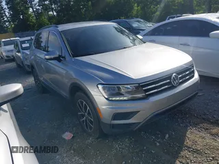 2021 Volkswagen Tiguan SE z VIN 3VV3B7AX0MM003268, wystawiony jako IAAI lot #42509806 z przebiegiem 76 430 mil mil oraz . Historia ofert i sprzedaży dostępna na DreamBid. Obrazek 1.