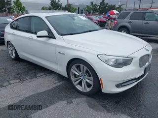 2011 BMW 5 Series GT 550i with VIN WBASN4C59BC210040, listed as a IAAI auction lot 42140088 with 130,771 mi miles. Bid and sale history available at carsss.com. Image 1.