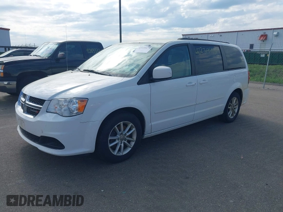 2016 Dodge Grand Caravan SXT with VIN 2C4RDGCG9GR380632, listed as a IAAI auction lot 42239479 with 197,316 mi miles and . Bid and sale history available at DreamBid. Image 2.