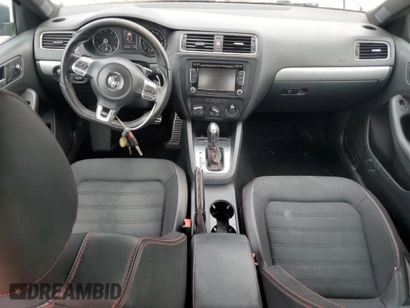 2014 Volkswagen Jetta GLI z VIN 3VW4T7AJ2EM245201, wystawiony jako Copart lot #64901935 z przebiegiem 147 799 mil mil oraz Czysty tytuł • Clean title. Historia ofert i sprzedaży dostępna na DreamBid. Obrazek 8.
