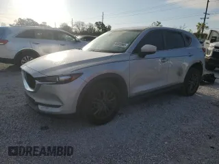 2020 Mazda CX-5 Touring with VIN JM3KFACM8L0764878, listed as a Copart auction lot 49303865 with 114,890 mi miles and Salvage Title. Bid and sale history available at carsss.com. Image 1.