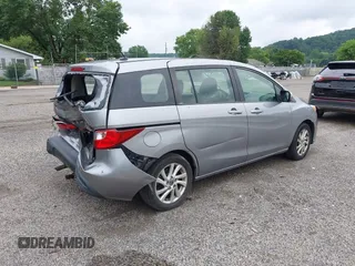 2014 Mazda 5 Sport z VIN JM1CW2BL5E0172594, wystawiony jako IAAI lot #42628707 z przebiegiem 180 369 mil mil oraz . Historia ofert i sprzedaży dostępna na DreamBid. Obrazek 4.