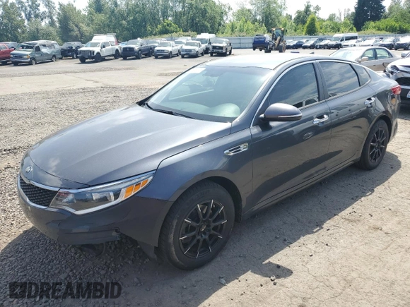2016 Kia Optima LX z VIN KNAGT4L31G5108978, wystawiony jako Copart lot #60933375 z przebiegiem 144 643 mil mil oraz Czysty tytuł • Clean title. Historia ofert i sprzedaży dostępna na DreamBid. Obrazek 1.