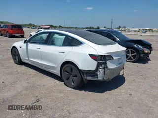 2018 Tesla Model 3 Long Range Battery with VIN 5YJ3E1EAXJF027179, listed as a IAAI auction lot 42059918 with 43,566 mi miles. Bid and sale history available at carsss.com. Image 3.