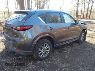 2024 Mazda CX-5 S Select with VIN JM3KFBBM7R0421754, listed as a IAAI auction lot 41421026 with 7,964 mi miles and . Bid and sale history available at DreamBid. Image 4.