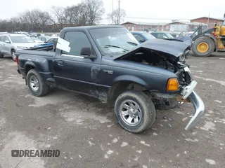 2003 Ford Ranger XL with VIN 1FTYR10D23PA85808, listed as a IAAI auction lot 41274362 with 294,709 mi miles. Bid and sale history available at carsss.com. Image 1.
