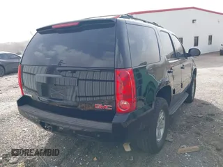 2012 GMC Yukon SLT with VIN 1GKS1CE01CR221109, listed as a IAAI auction lot 41820717 with 201,893 mi miles. Bid and sale history available at carsss.com. Image 4.