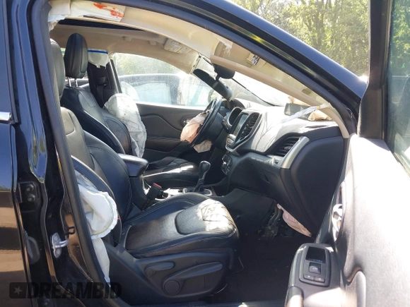 2014 Jeep Cherokee Limited with VIN 1C4PJLDB1EW204545, listed as a IAAI auction lot 42261081 with 260,164 mi miles and . Bid and sale history available at DreamBid. Image 5.