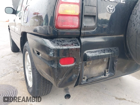 1999 Toyota RAV4 with VIN JT3GP10VXX7061972, listed as a IAAI auction lot 42474051 with 229,406 mi miles and . Bid and sale history available at DreamBid. Image 6.