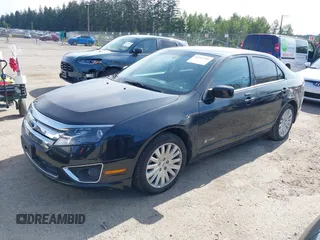2012 Ford Fusion Hybrid z VIN 3FADP0L31CR380821, wystawiony jako IAAI lot #42332256 z przebiegiem 59 431 mil mil oraz . Historia ofert i sprzedaży dostępna na DreamBid. Obrazek 2.