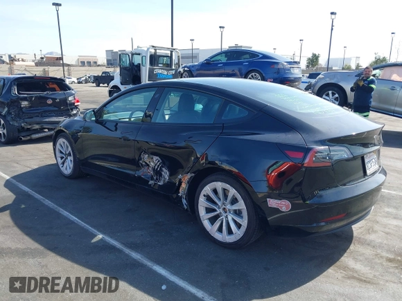 2022 Tesla Model 3 Long Range with VIN 5YJ3E1EB1NF133356, listed as a IAAI auction lot 41568303 with 73,406 mi miles and . Bid and sale history available at DreamBid. Image 13.