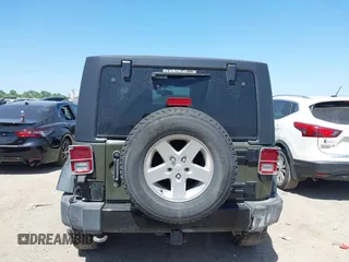 2015 Jeep Wrangler Sport with VIN 1C4AJWAGXFL650428, listed as a IAAI auction lot 42010629 with 80,039 mi miles. Bid and sale history available at carsss.com. Image 16.