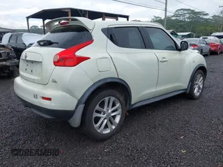 2011 Nissan Juke SL with VIN JN8AF5MR5BT009985, listed as a IAAI auction lot 41469296 with 128,572 mi miles. Bid and sale history available at carsss.com. Image 4.